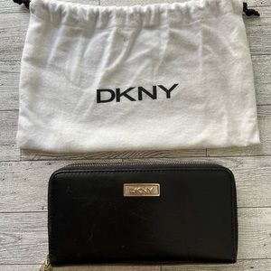 DKNY Black Leather Wallet. Duo gold-toned zippers. Excellent condition.